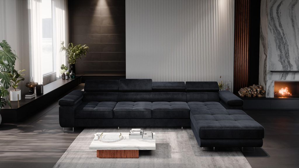 A modern living room with a large sectional sofa, coffee table, and fireplace.