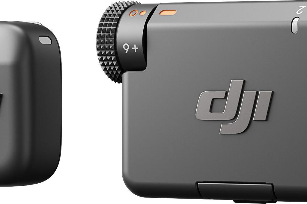 Close-up of two black electronic devices, likely audio transmitters, against a white background. The device on the right has the DJI logo and some text.