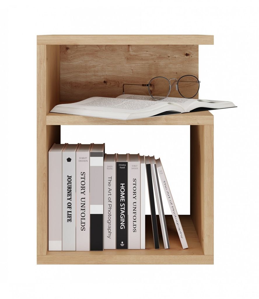 A wooden bedside table with books and glasses on it.
