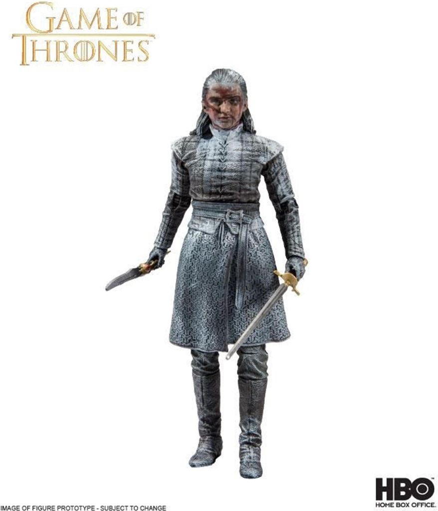 A Game of Thrones action figure of Arya Stark holding two swords.