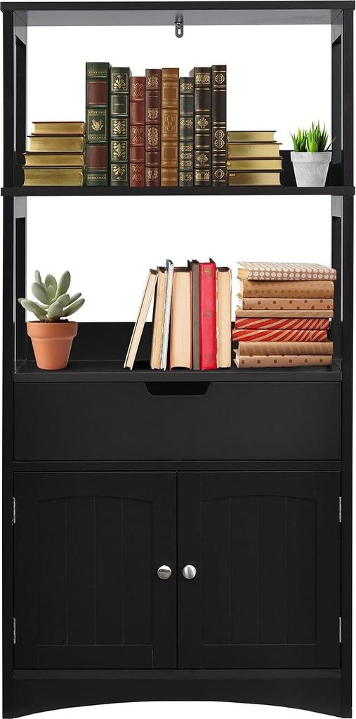 A black wooden storage cabinet with three shelves, a drawer, and two doors, filled with books and a potted plant.