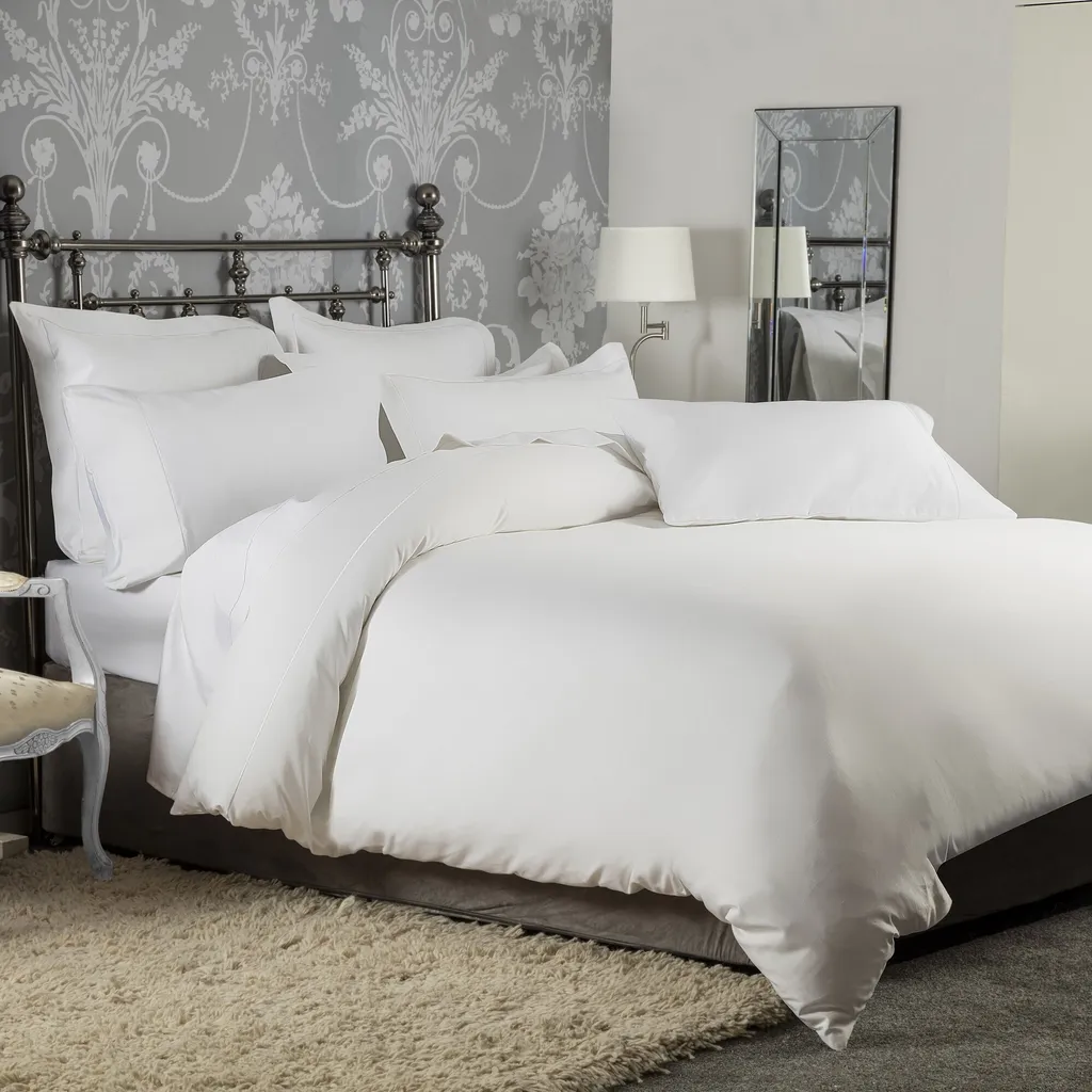 Housse de couette 1200 fils blanche : finissez-en avec les draps rêches