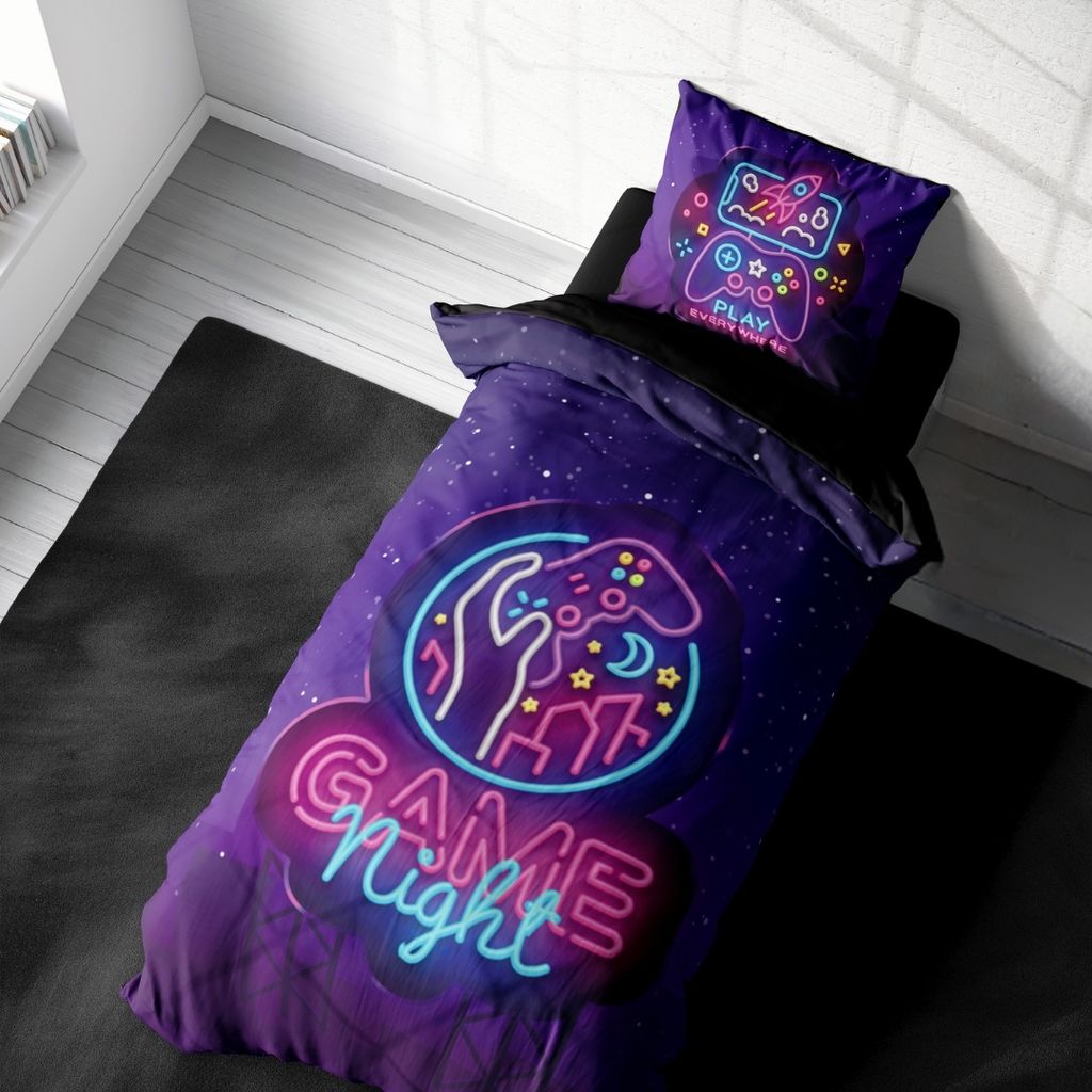 A gaming-themed duvet cover and pillow set on a bed.