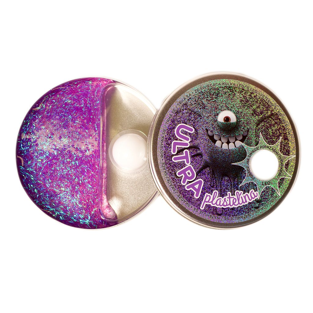 Two round containers, one filled with glittery purple material, the other with a cartoon monster graphic.