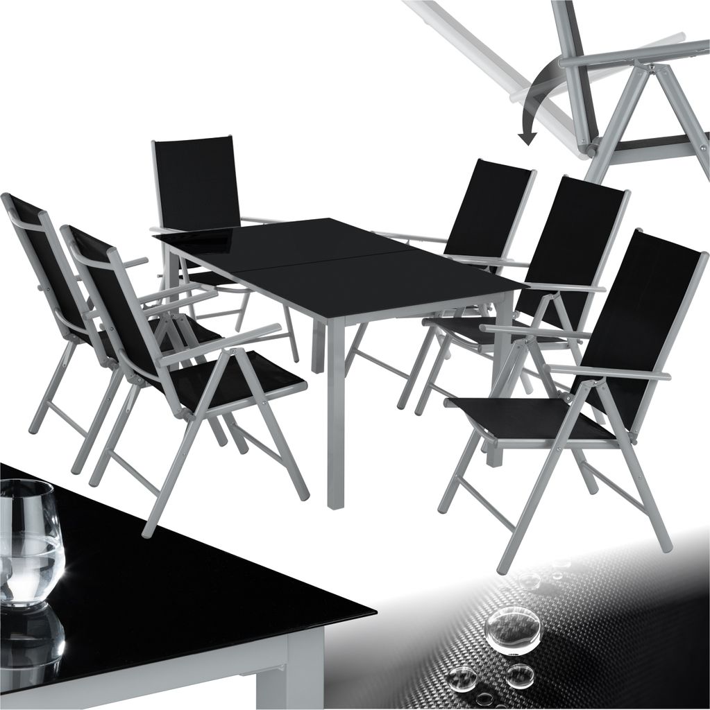 A dining set with a table and chairs.