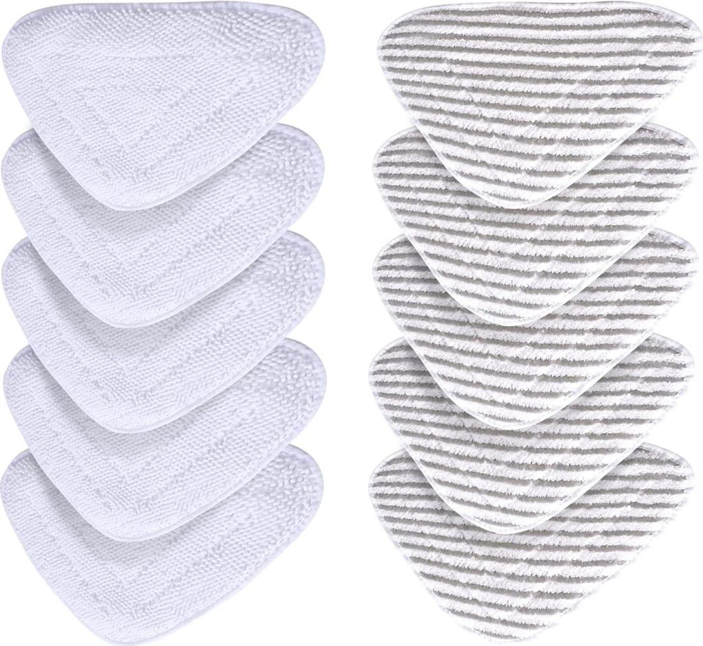 Two stacks of triangular cleaning pads, one stack is solid white, the other is white with gray stripes.