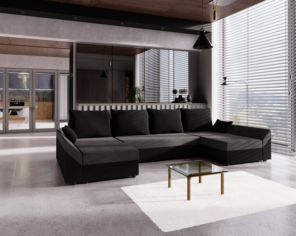 A modern living room with a large U-shaped sofa, a coffee table, and blinds covering a large window.