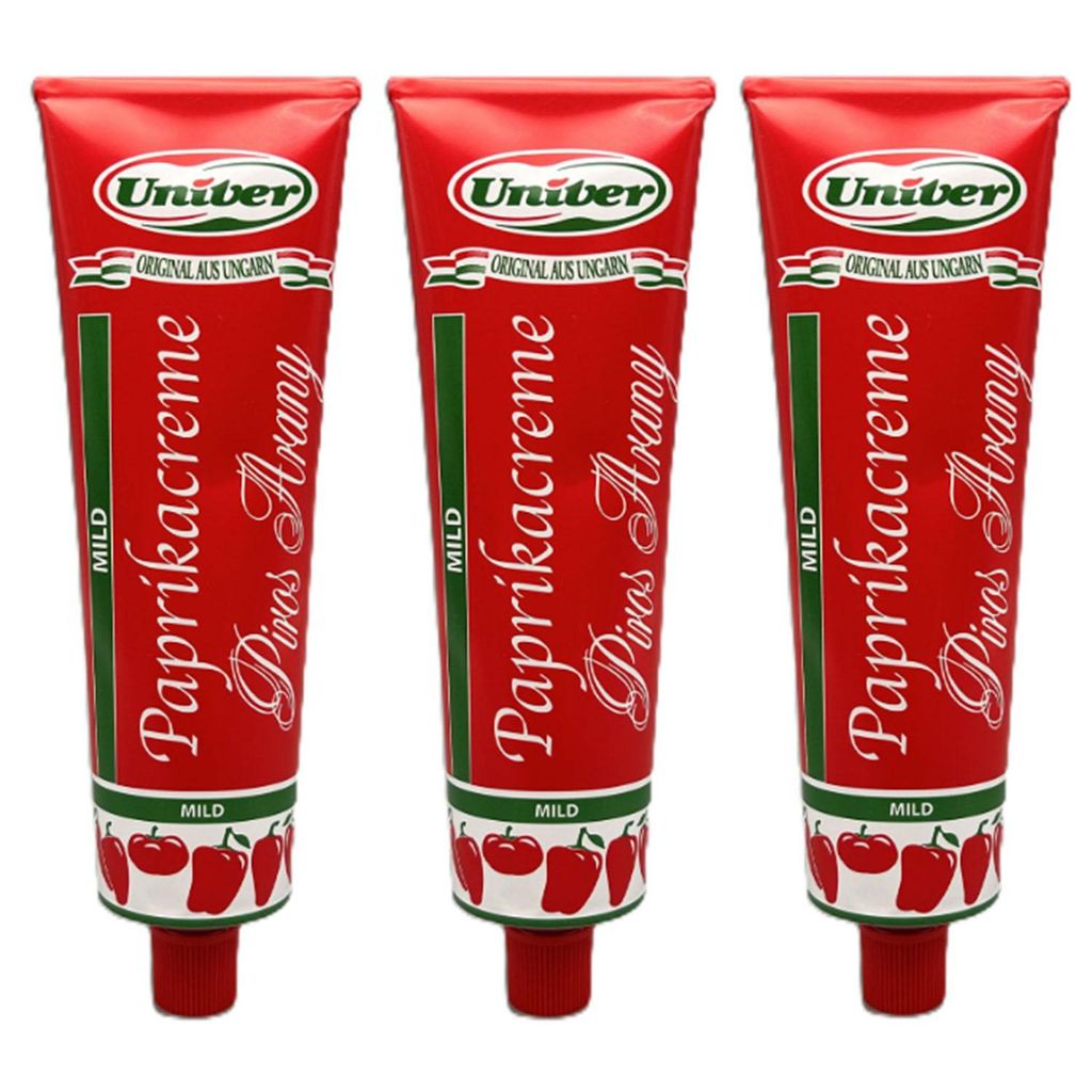Three tubes of Univer Paprikacreme mild are displayed side-by-side against a white background.
