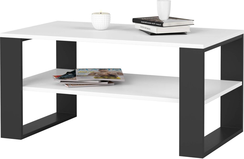 A modern coffee table with a white top and black frame.