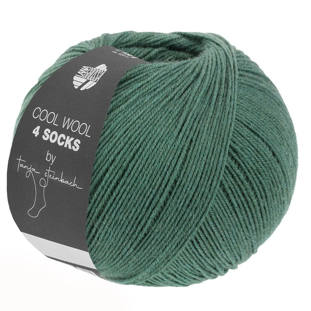 A ball of green yarn with a dark label.