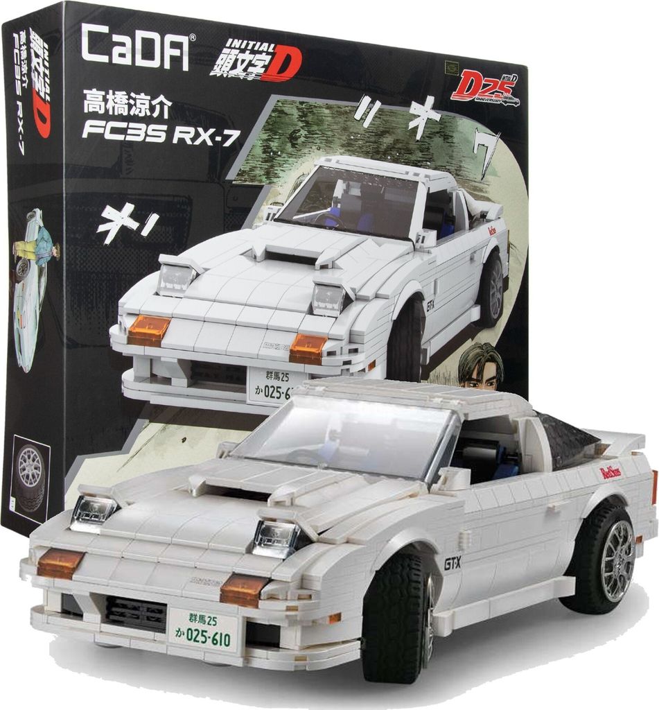 A white building block model of a Mazda FC3S RX-7 car is displayed in front of its packaging box.