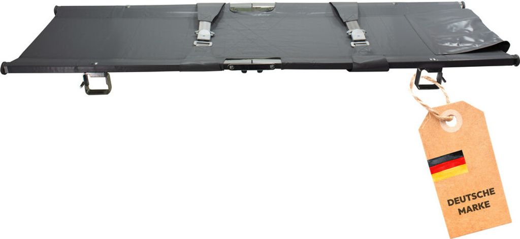 A folded stretcher with a tag attached.