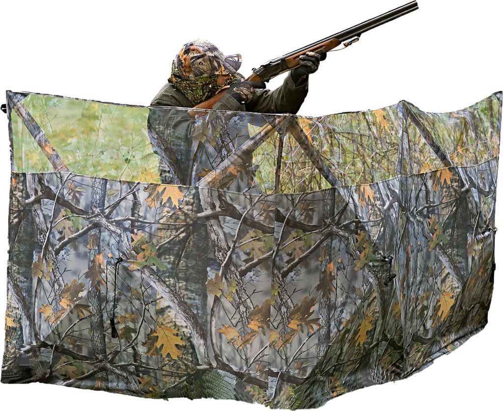 A person is using a camouflage hunting blind.