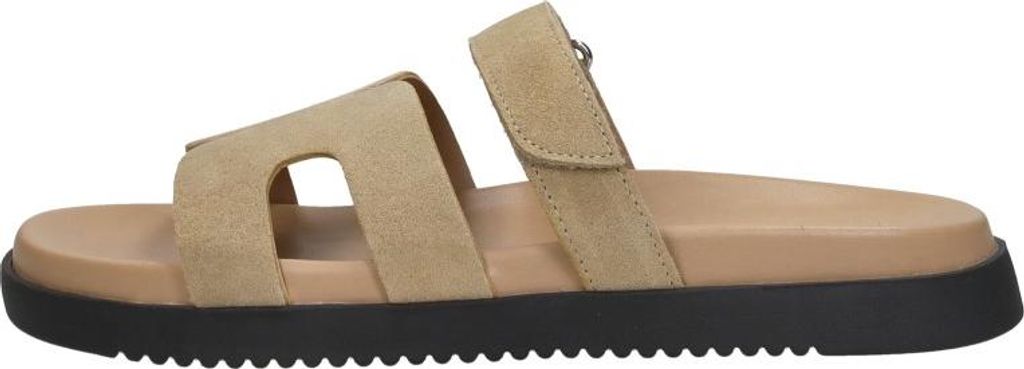 A side view of a single sandal.