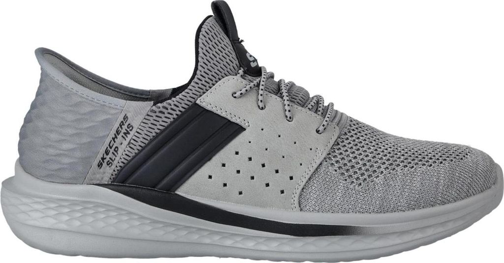 A side view of a gray Skechers men's shoe.