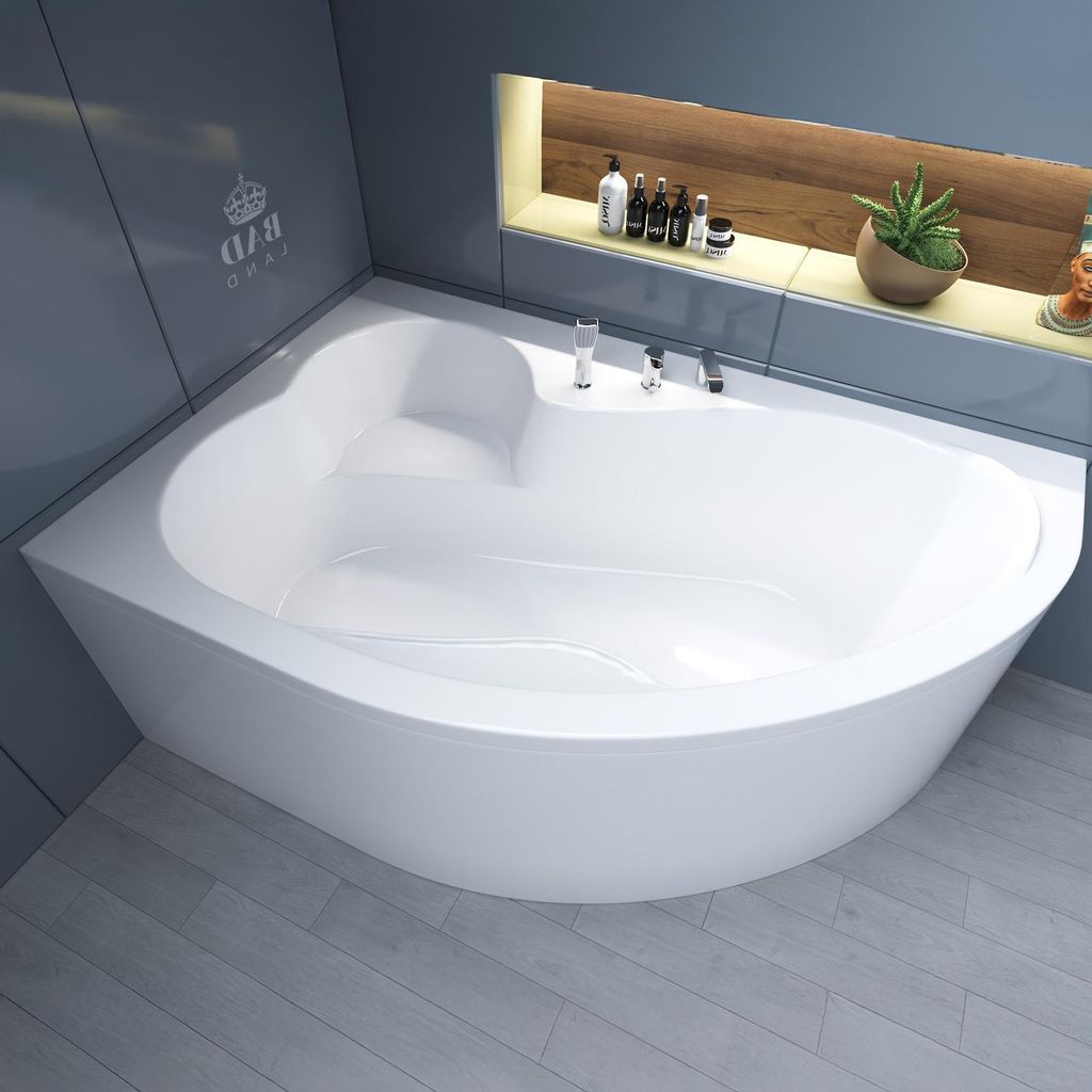 A white corner bathtub in a modern bathroom setting.