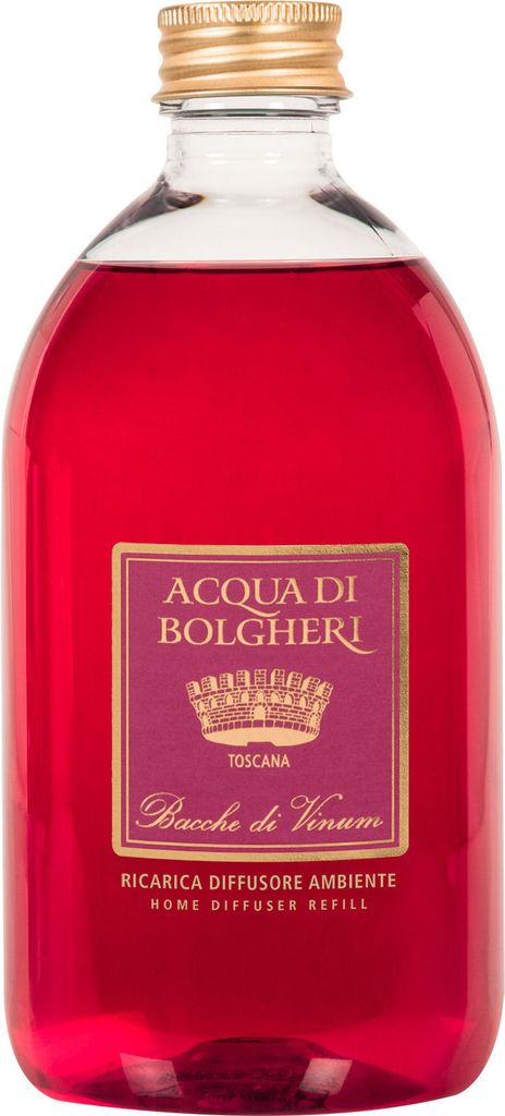 A clear studio shot of a bottle of red liquid with a label.