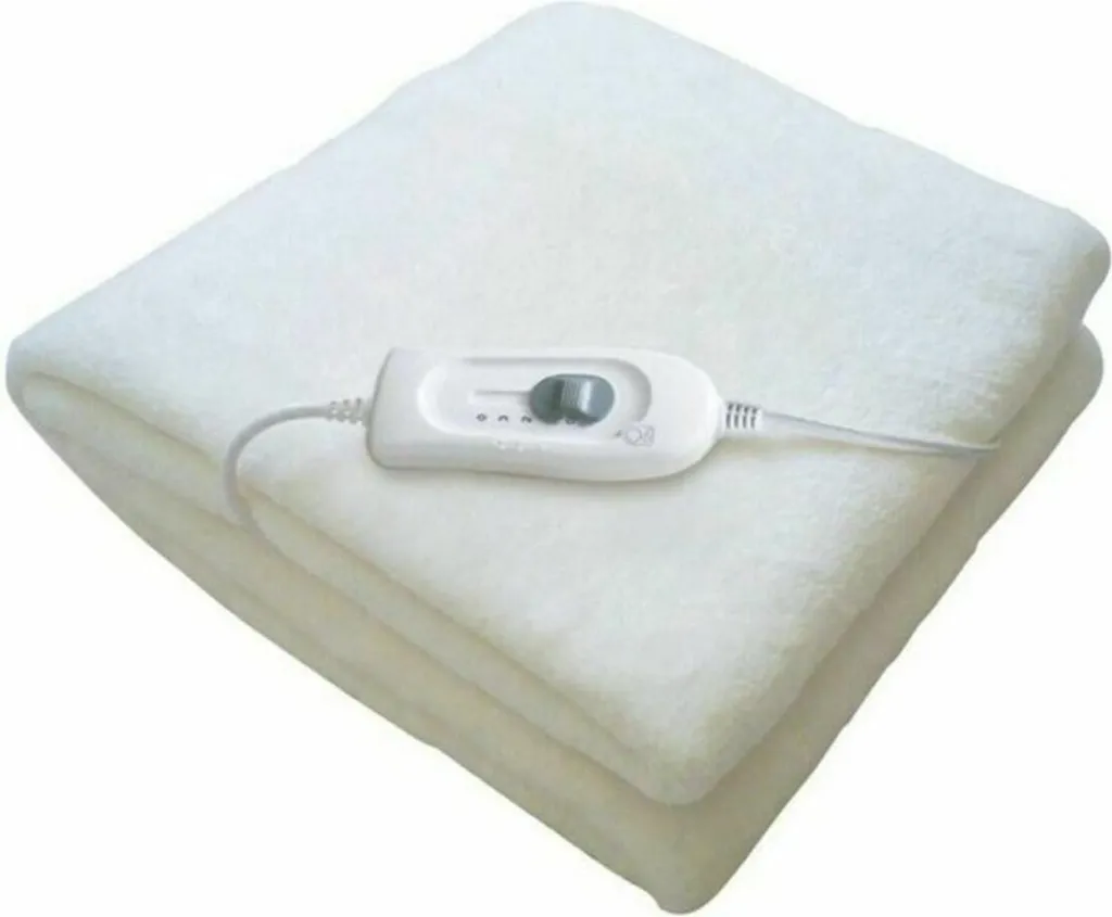 Dites Adieu au Lit Froid avec cette Couverture Chauffante Lavable 150x70 cm