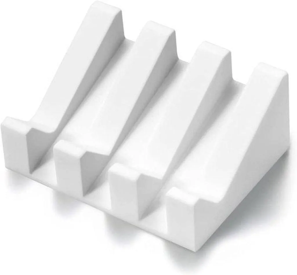 Porte-savon blanc minimaliste idéal pour garder un lavabo propre et sec