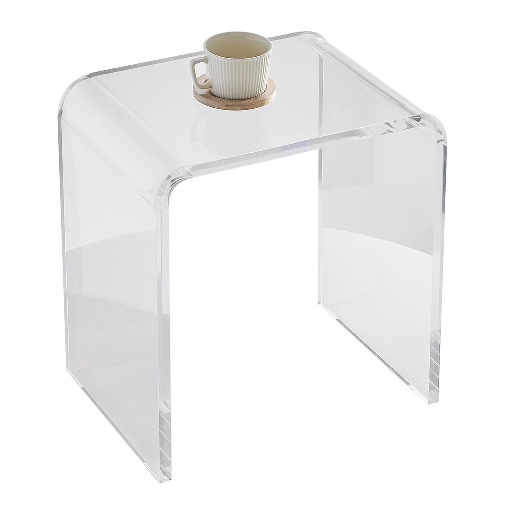 A clear acrylic U-shaped side table with a cup and coaster on top, isolated on a white background.