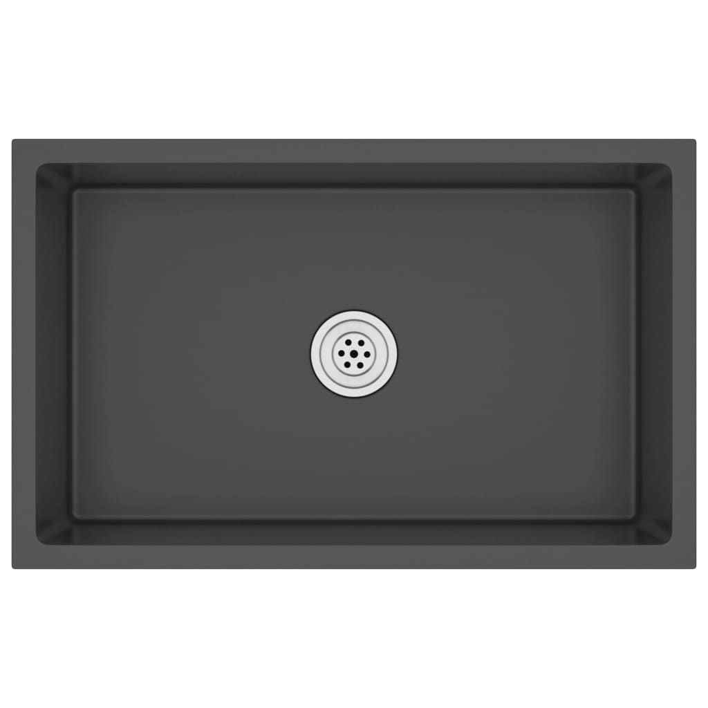 A top-down view of a dark gray rectangular sink with a silver drain in the center.