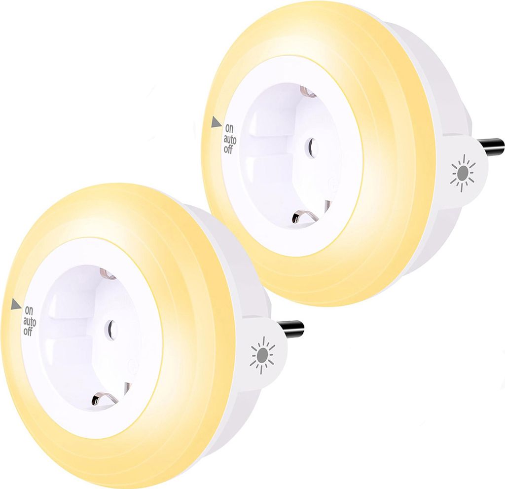 Two white LED night light plug-in adapters with a warm yellow glow around the rim, shown from a slightly angled front view.