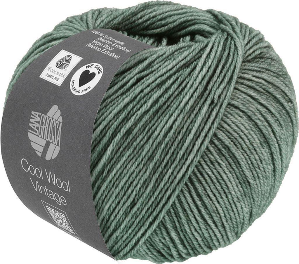 A ball of green-grey yarn with a label.