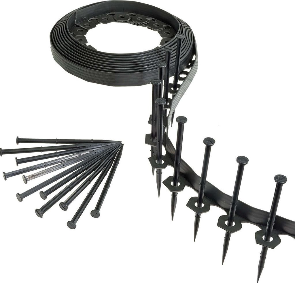 A roll of black flexible garden edging and a pile of black stakes on a white background.