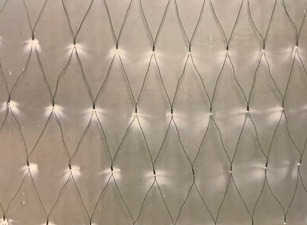 A close-up view of a net of white LED lights against a light gray background.