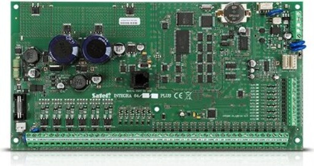 A circuit board with many electronic components and connectors.