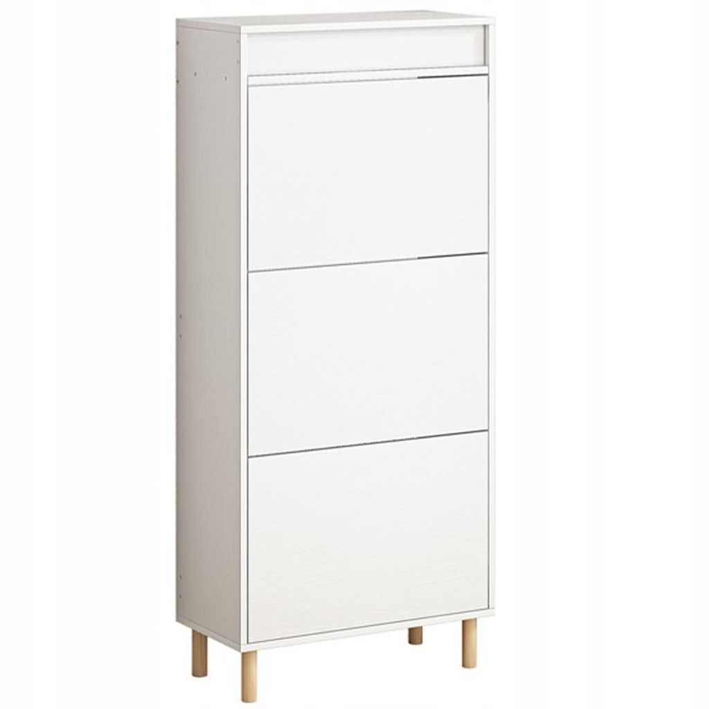 A white shoe cabinet with three flip-down doors and wooden legs, shown against a white background.