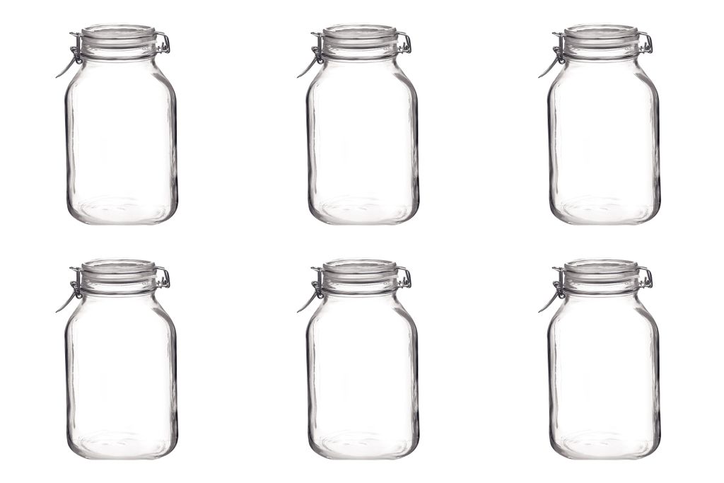 Six clear glass jars with metal clamp lids are arranged in two rows of three on a white background.
