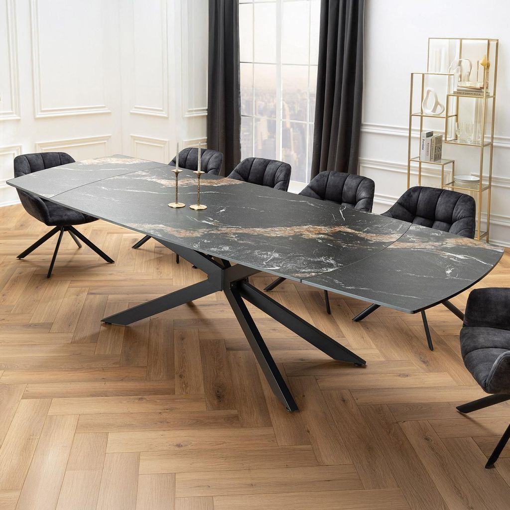 A dining table with chairs in a modern dining room.
