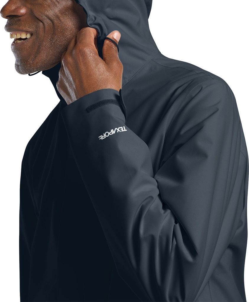A man wearing a blue jacket.