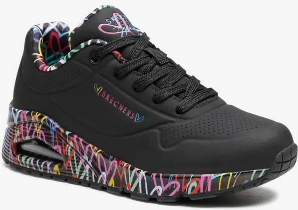 A black Skechers shoe with colorful graffiti-style artwork on the sole and inner lining.