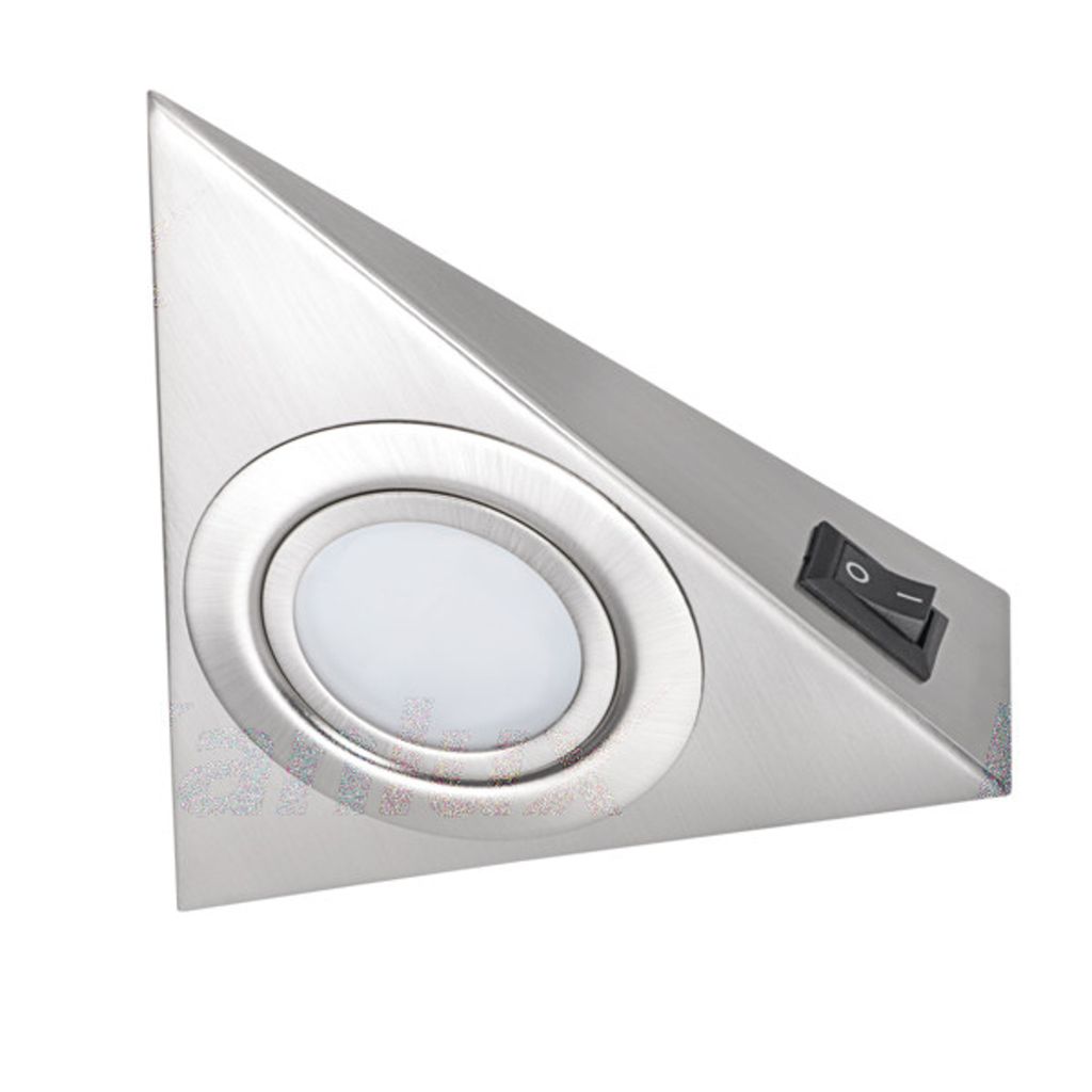 A triangular under-cabinet light with a brushed metal finish and a black switch.