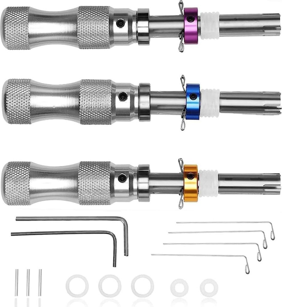 A set of three tubular lock pick tools with different colored rings (purple, blue, gold) and various small accessories like hex keys and pins.