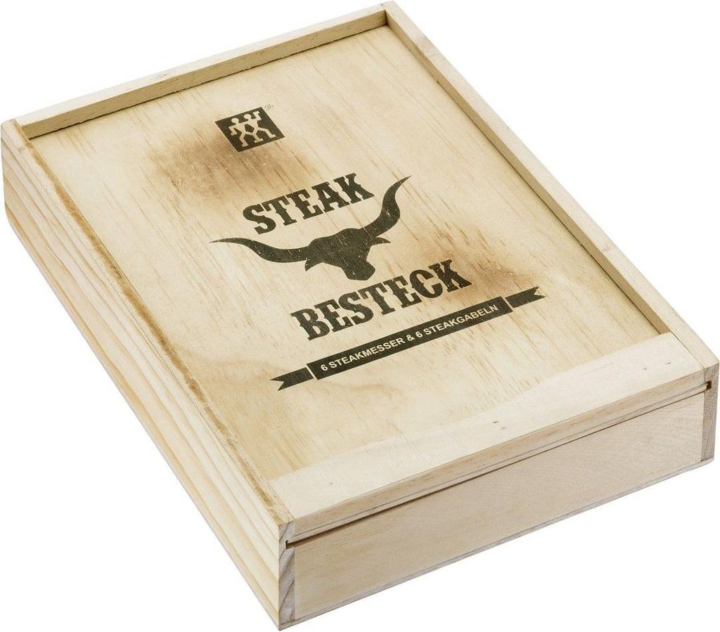 A wooden box with text and a bull logo on the lid.