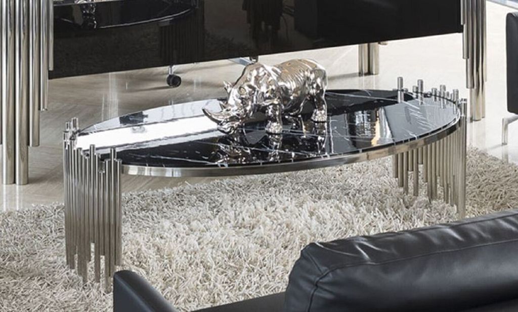 Casa Padrino Luxus Couchtisch mit Kunstmarmor Tischplatte Schwarz / Silber 140 cm - Luxus Möbel
