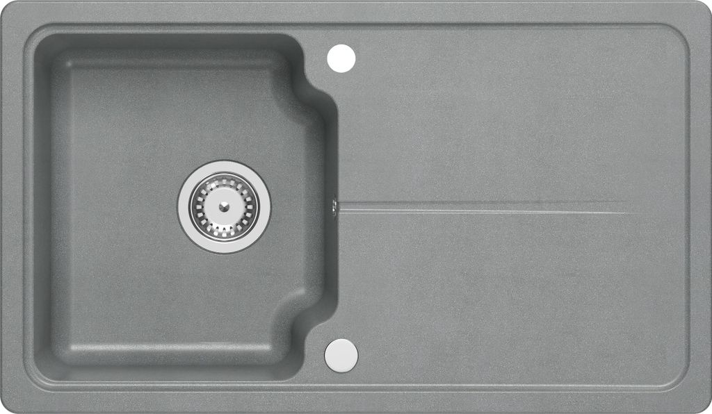 A top-down view of a gray granite kitchen sink with a drain and a drying area.