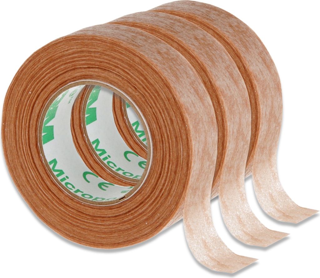 A close-up studio shot of three rolls of medical tape, stacked diagonally.