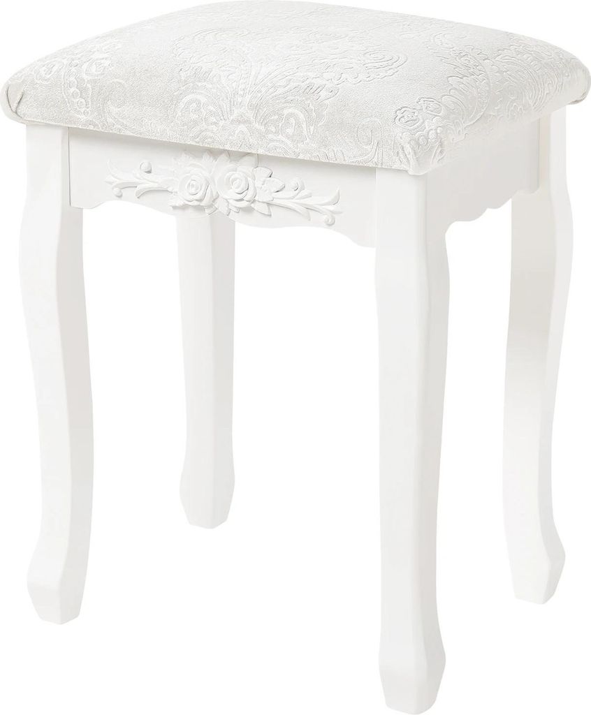 A white vanity stool with a patterned seat.