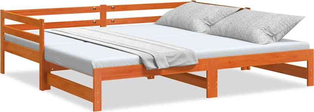 A wooden daybed with a mattress and pillows, shown from a side angle against a white background.