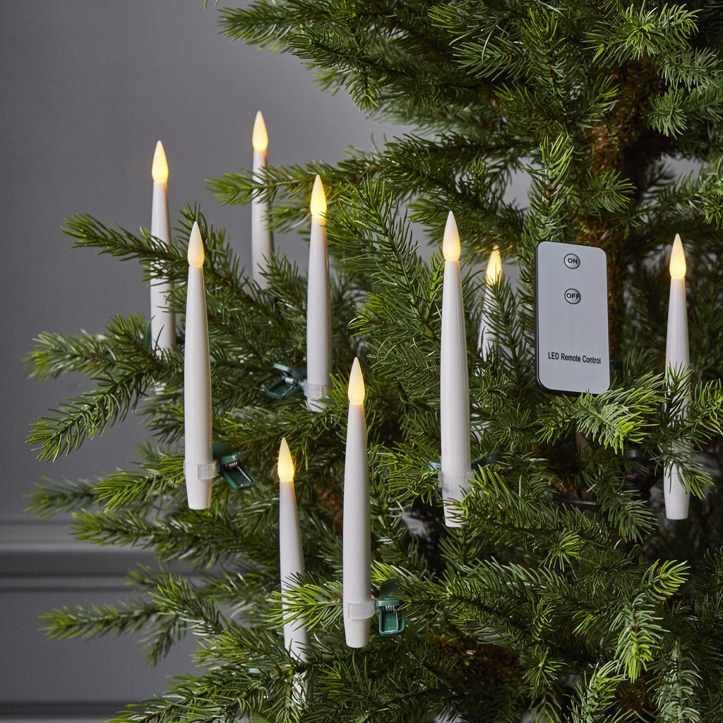 LED candles on a Christmas tree with a remote control.