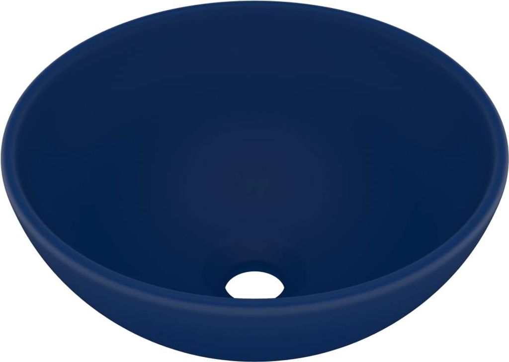 A dark blue ceramic sink with a drain hole in the center.