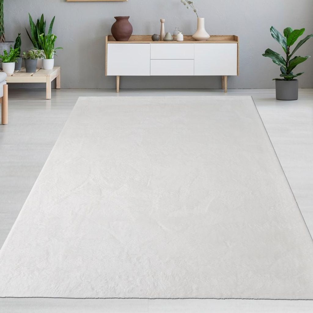 Tapis blanc aspect peau de lapin élégant et doux avec un Image du produit 