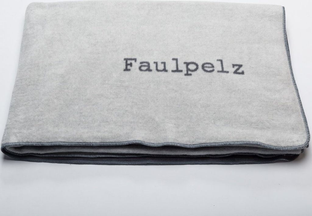 A folded gray blanket with the word 'Faulpelz' embroidered on it, placed on a white background.