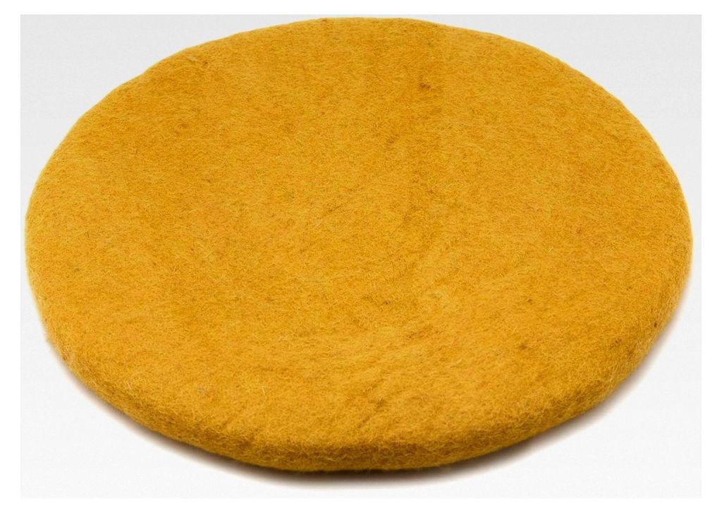 Rundes Sitzkissen aus Filz in verschiedenen Rot-, Gelb- und Orangetönen