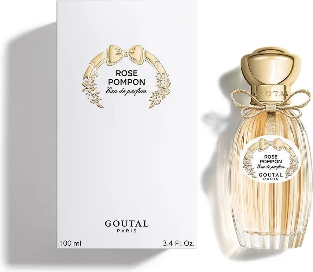 A perfume box and bottle are displayed side-by-side against a white background.