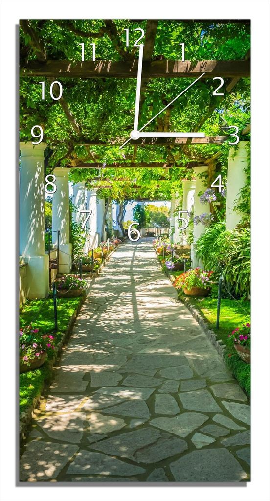 Wallario Design Wanduhr Blühende Pergola aus Echtglas, Größe 30 x 60 cm